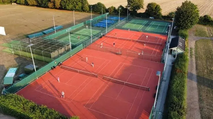 Aerial view of matches on the clay courts at Wargrave Tennis Club